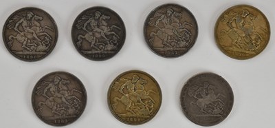 Lot 1710 - A group of seven silver crowns, comprising...