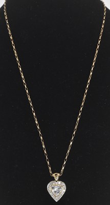 Lot 1417 - A 9ct gold heart shaped pendant, with heart...