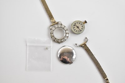 Lot 565 - A 9ct yellow gold, white metal and diamond...