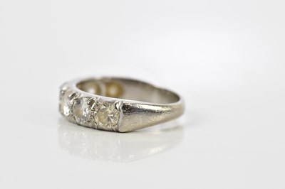 Lot 40 - An 18ct white gold seven stone diamond half...