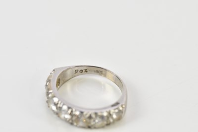 Lot 40 - An 18ct white gold seven stone diamond half...