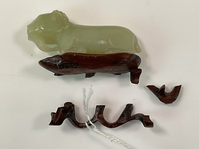 Lot 22 - A 19th century Chinese carved mutton fat jade...