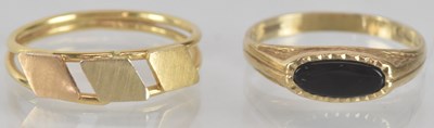 Lot 1296 - Two 9ct gold rings, one with oblong bezel set...