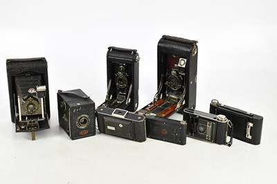 Lot 2493 - A collection of eight vintage cameras,...
