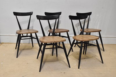 Lot 2004 - ERCOL; five ebonised and elm seated model 392...