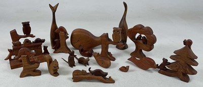 Lot 39 - JUDY FRADGLEY, a group of small wooden carved...