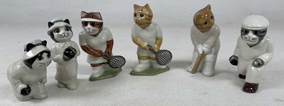 Lot 258 - QUAIL CERAMICS; six cat figures taking part in...