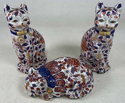 Lot 262 - Three cat figures decorated in the Imari...