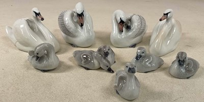 Lot 209 - ROYAL COPENHAGEN; a group of swan and cygnet...