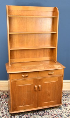 Lot 1460 - An Ercol type light oak dresser, with three...