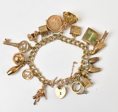 Lot 218 - A 9ct gold bracelet containing seventeen...