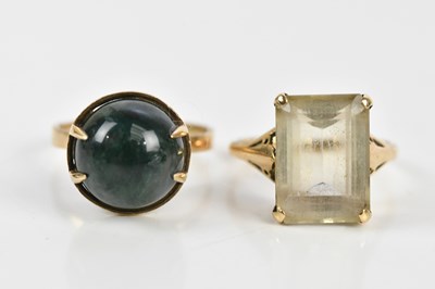 Lot 179 - A 9ct yellow gold dress ring with emerald cut...