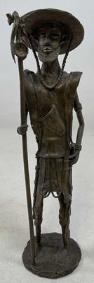 Lot 195 - A Tanzanian bronze figure of a warrior,...