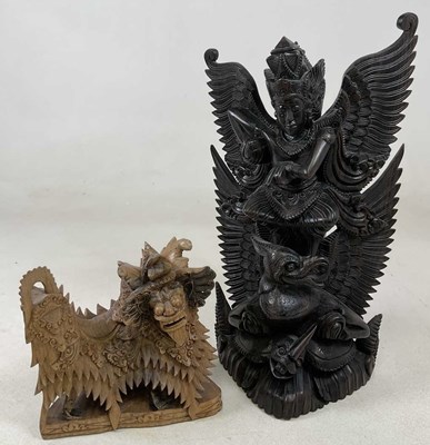 Lot 243 - A large hardwood Balinese carving, height 49cm,...