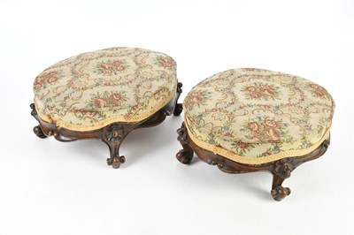 Lot 2200 - A pair of Victorian walnut footstools, height...