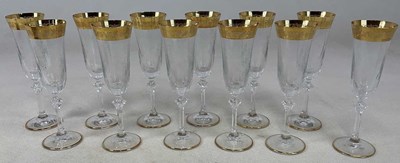 Lot 274 - A set of twelve glass gilt heightened...