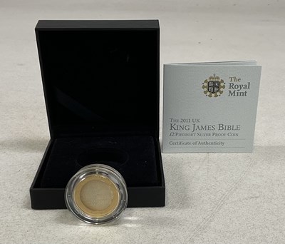 Lot 465 - ROYAL MINT; a 2011 £2 King James Bible Silver...