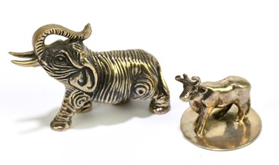 Lot 2388 - Two white metal figures, one in the form of an...