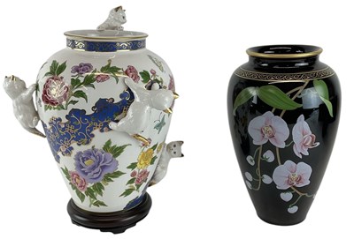 Lot 654 - FRANKLIN MINT; a large porcelain vase,...