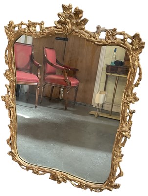 Lot 56 - A modern floral gilt framed rectangular wall...