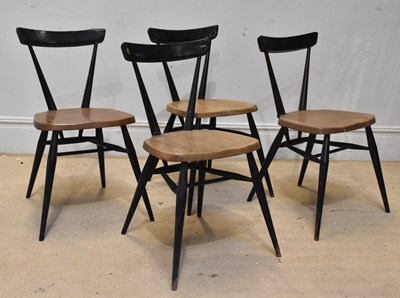 Lot 2003 - ERCOL; four ebonised and elm seated model 392...
