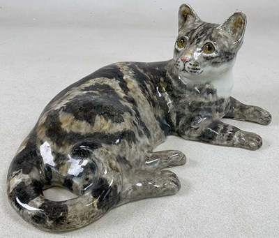 Lot 246 - WINSTANLEY; a tabby cat, in a recumbent...