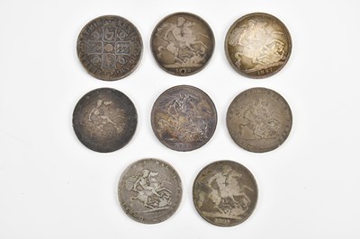 Lot 1453 - A collection of eight silver crowns including...