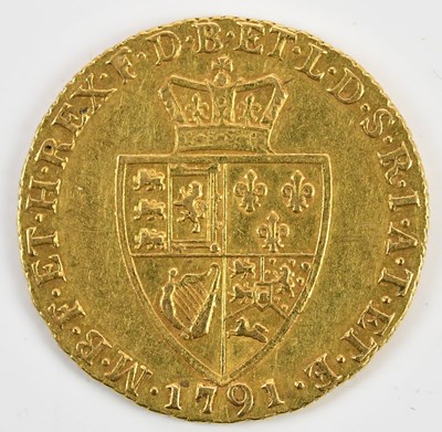 Lot 1516 - A George III shield back spade guinea, 1791.