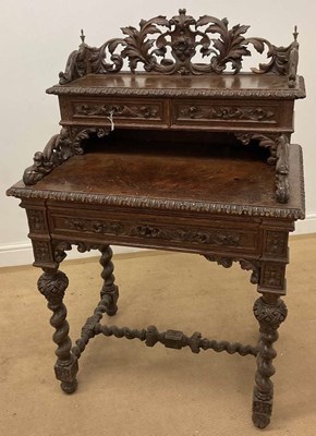 Lot 689 - A Victorian carved oak desk with rope twist...