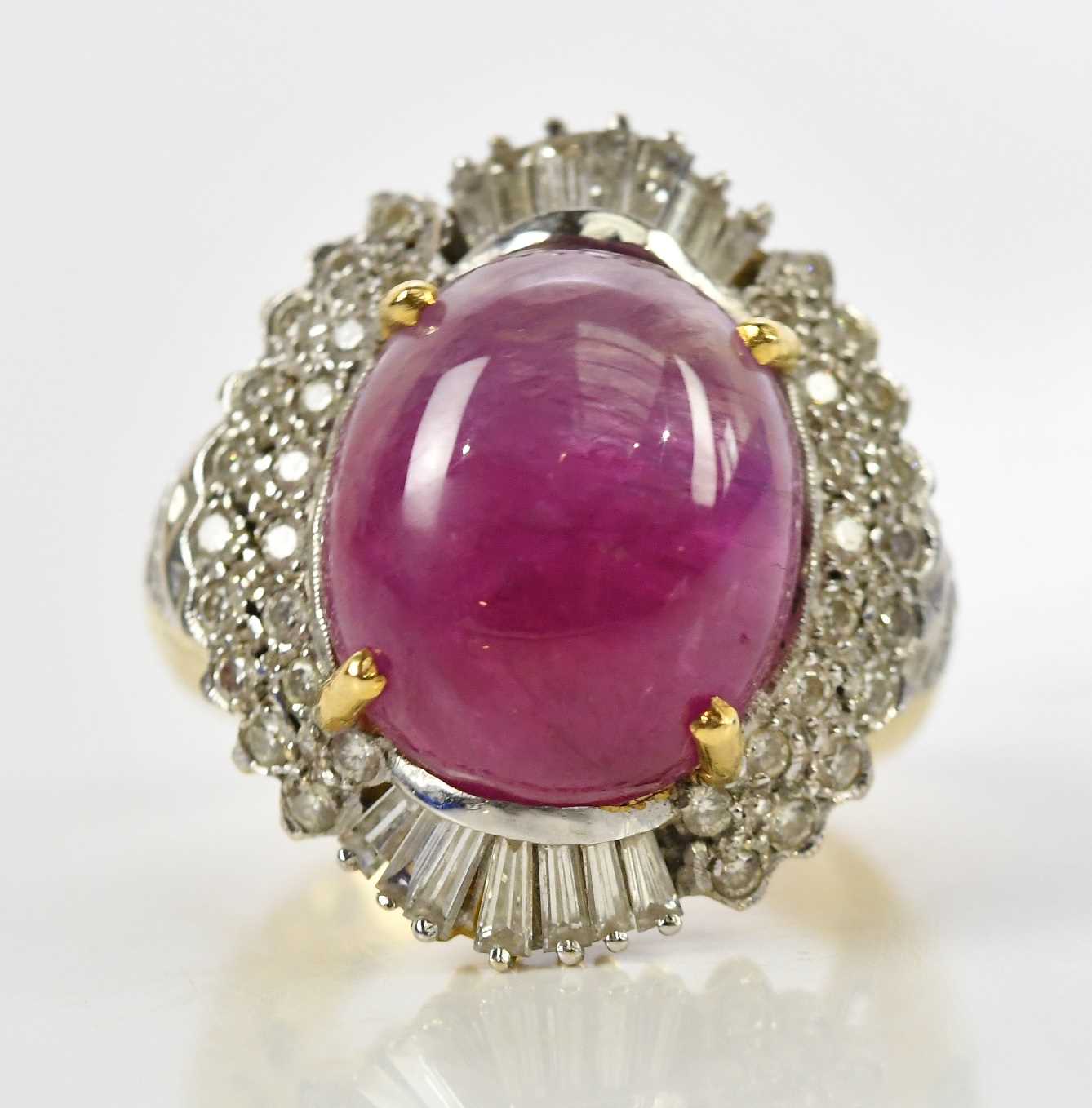 Lot 42 - A yellow metal diamond and ruby cocktail ring,...