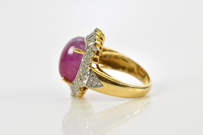 Lot 42 - A yellow metal diamond and ruby cocktail ring,...