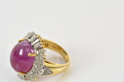 Lot 42 - A yellow metal diamond and ruby cocktail ring,...