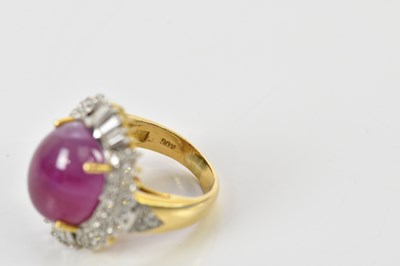 Lot 42 - A yellow metal diamond and ruby cocktail ring,...
