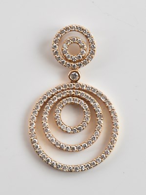 Lot 325 - An 18ct gold diamond set pendant formed of two...