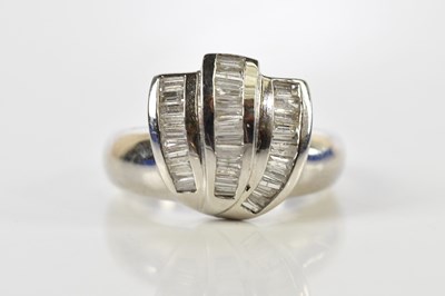 Lot 60 - An 18ct white gold diamond set ring, with...