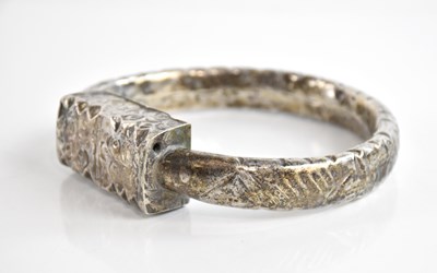 Lot 1334 - A white metal ankle/arm bracelet, possibly...