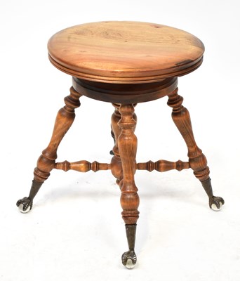 Lot 108 - An early 20th century American walnut...