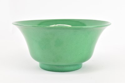 Lot 391 - A Chinese Qing dynasty green glazed bowl,...