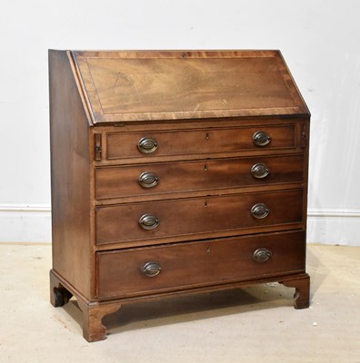 Lot 2151 - A Georgian mahogany bureau, with fall front...