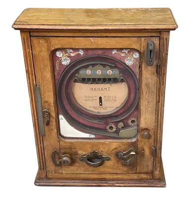 Lot 293 - A 1920s stained pine cased 'Regent'...