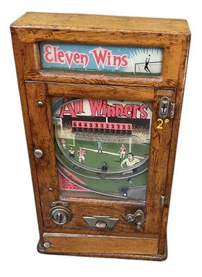 Lot 294 - PARKERS AUTOMATIC SUPPLIES; a 1920s oak cased...