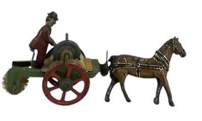 Lot 598 - A German 1920s tin plated penny toy horsedrawn...