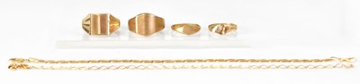 Lot 938 - Four 9ct yellow gold rings, comprising two...