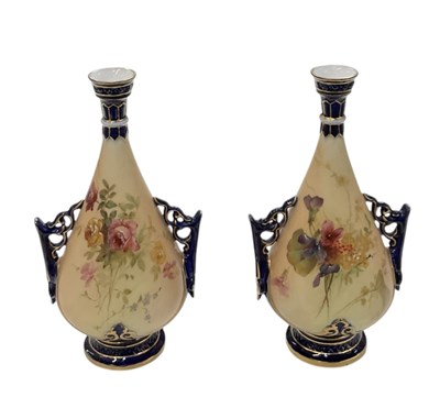 Lot 674 - ROYAL WORCESTER; a pair of blush ivory hand...