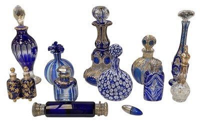 Lot 689 - A collection of thirteen blue glass and gilt...