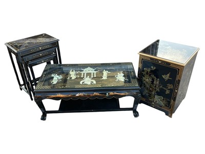 Lot 2103 - A nest of three lacquer tables, with...