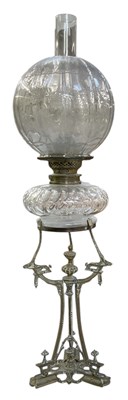 Lot 111 - An early 20th century brass oil lamp, with...