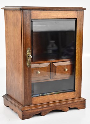 Lot 2343 - An early 20th century walnut smoker's cabinet,...