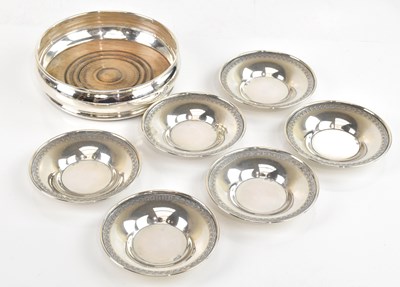 Lot 1295 - Six Eastern white metal circular dishes, with...
