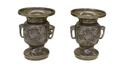 Lot 786 - A pair of Japanese Meiji period bronze twin...
